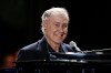 FILE - Musician Bruce Hornsby performs at the North American International Auto Show in Detroit on Jan. 14, 2013. (AP Photo/Paul Sancya, File)