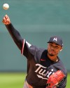 Minnesota Twins starting pitcher Taj Bradley throws during the first inning of a baseball game against the Kansas City Royals, Thursday, April 2, 2026, in Kansas City, Mo. (AP Photo/Charlie Riedel)