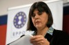 FILE - European chief prosecutor Laura Codruta Kovesi checks her notes during a press conference following meetings with Greek officials on various issues, at a custom of Piraeus port, near Athens, Greece, Thursday, Oct. 2, 2025. (AP Photo/Thanassis Stavrakis, File)