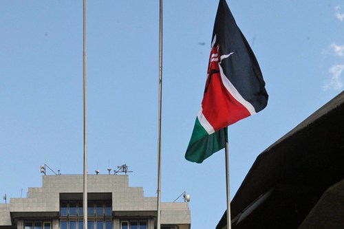 The Kenyan flag flies at the Kenyatta International Conference Centre during Kenya President Mwai Kibaki's speech inside the building in Nairobi, Kenya, Aug. 5, 2010. (AP Photo/Sayyid Azim, File)