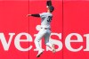New York Yankees left fielder Cody Bellinger (35) catches a fly ball by Miami Marlins' Xavier Edwards (9) during the ninth inning of a home-opener baseball game, Friday, April 3, 2026, in New York. (AP Photo/Yuki Iwamura)