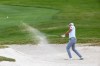 Canadian A.J. Ewart hits his ball out of a sand trap on the seventh. hole during the second round of the Texas Open golf tournament, Friday, April 3, 2026, in San Antonio. (Andrew J. Whitaker/The San Antonio Express-News via AP)