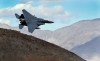 FILE - An F-15E Strike Eagle turns toward the Panamint range over Death Valley National Park, Calif., on Feb. 27, 2017. (AP Photo/Ben Margot, File)