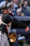 Miami Marlins catcher Liam Hicks throws the ball back to pitcher Michael Petersen during the seventh inning of a home-opener baseball game against the New York Yankees, Friday, April 3, 2026, in New York. (AP Photo/Yuki Iwamura)