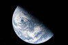 This image from video provided by NASA shows a view of earth taken by NASA astronaut and Artemis II Commander Reid Wiseman from one of the Orion spacecraft's four windows after completing the translunar injection burn, Thursday, April 2, 2026. (NASA via AP)