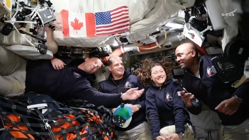 In this image from video provided by NASA, Artemis II astronauts, from left, Reid Wiseman, Jeremy Hansen, Christina Koch and Victor Glover gather for an interview en route to the moon on Saturday, April 4, 2026. (NASA via AP)