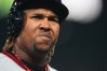 Cleveland Guardians' José Ramirez walks back to the dugout after flying out against the Seattle Mariners during the fourth inning of an opening-day baseball game, Thursday, March 26, 2026, in Seattle. (AP Photo/Lindsey Wasson)