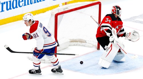 Montreal Canadiens centre Oliver Kapanen (91) reacts after scoring against New Jersey Devils goaltender Jake Allen (34) during shootout in an NHL hockey game, Saturday, April 4, 2026, in Newark, N.J. (AP Photo/Noah K. Murray)