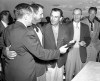 FILE - Ben Hogan, third from left, of Fort Worth, Texas, receives his plaque for winning the Masters golf tournament from Bobby Jones, left, in Augusta, Ga. on April 8, 1951. Others are: Skee Riegel, runner up; Cliff Roberts, tournament chairman; and Charles Coe, low amateur. (AP Photo/Horace Cort, File)