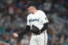 Miami Marlins pitcher Pete Fairbanks reacts after getting the final out during the ninth inning of a baseball game against the Colorado Rockies, Friday, March 27, 2026, in Miami. (AP Photo/Lynne Sladky)