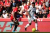 Real Madrid's Vinicius Junior in action in front of Mallorca's Pablo Maffeo during a La Liga soccer match between Mallorca and Real Madrid in Palma de Mallorca, Spain, Saturday, April 4, 2026. (AP Photo/Jose Breton)