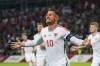 FILE - Wales' Aaron Ramsey celebrates after scoring his side's opening goal during the Euro 2024 group D qualifying soccer match between Latvia and Wales in Riga, Latvia, on Sept. 11, 2023. (AP Photo/Roman Koksarov, File)