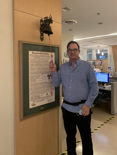 Michael Groves rings the bell at The Ottawa Hospital cancer centre after finishing his final round of chemotherapy for colorectal cancer in this undated handout photo. THE CANADIAN PRESS/Handout - Michael Groves (Mandatory Credit)