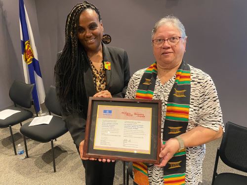 Andrea Davis, left, the executive director of the Black Loyalist Heritage Centre, and Sheila Hartley-Scott, president of the Black Loyalist Heritage Society's volunteer board are shown at the Nova Scotia Archives in Halifax on Saturday, March 21, 2026. THE CANADIAN PRESS/Lyndsay Armstrong