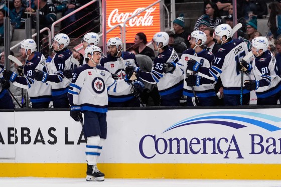 Morgan Barron celebrates with teammates after scoring a goal during the first period against the San Jose Sharks on Sunday in San Jose, Calif. (Godofredo A. Vásquez / The Associated Press)