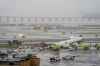 An Air Canada jet and Port Authority fire truck sit on the runway at LaGuardia Airport, Monday, March 23, 2026, after colliding with each other after the Jet landed Sunday night in New York. (AP Photo/Seth Wenig)