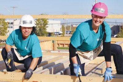 Employees at Johnston Group volunteer with Habitat for Humanity.