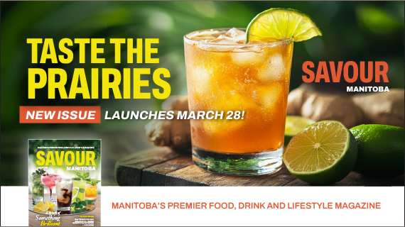 Iced drink with lime on a wooden surface beside the Savour Manitoba magazine cover.