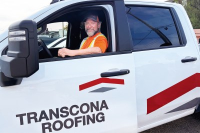 Transcona Roofing supports its crews with company vehicles that are properly equipped for daily site work.