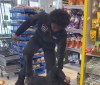 FACEBOOK

- a security guard stomps on a man at Dollorama over the weekend in an image from a video circulating over social media