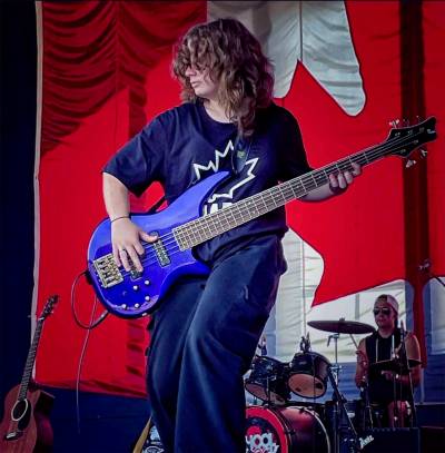 SUPPLIED
                                School of Rock student Desneige Ketcheson rocks out in Assiniboine Park on Canada Day with the house band.