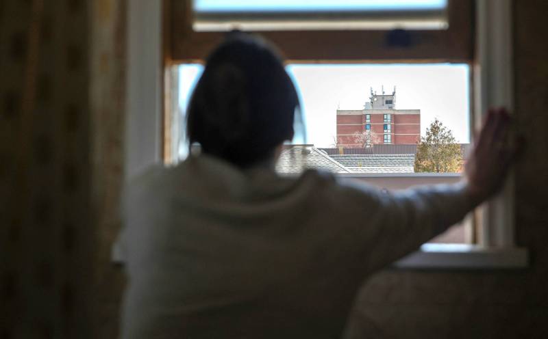 Ruth Bonneville Free Press LOCAL - stalker Stalking Story. Photo of Emma looking out her window at the apartment block, just 200 metres away, where he sometimes stays. The Judge allowed the stalker to live just 200 m away, instead of the usual 300m, upon his request. Anonymous photos of Emma (by herself and also with her mother) in their apartment in the Osborne Village area, to tell their story of being stalked by a un-homed man. They have a protection order but still have to deal with the fear of his return now that he is out of jail. STALKING CASE (for Saturday Front and Centre): When Emma met Anthony Edward Liwyj, he was banging on her front door in bare feet and with two black eyes, pleading for a drink of water. The 36-year-old Winnipeg woman didn’t know it then, but her willingness to help a stranger the morning of Aug. 4 would mark the beginning of a month of terror, in which she says Liwyj repeatedly turned up outside the home in the wee hours and late at night — trying to get in. “To this day, I still can’t figure it out and I think that’s the scariest part about it,” Emma said. She and her 66-year-old mother live together. See story by Tyler April 9th, 2026
                                Ruth Bonneville Free Press LOCAL - stalker Stalking Story. Photo of Emma looking out her window at the apartment block, just 200 metres away, where he sometimes stays. The Judge allowed the stalker to live just 200 m away, instead of the usual 300m, upon his request. Anonymous photos of Emma (by herself and also with her mother) in their apartment in the Osborne Village area, to tell their story of being stalked by a un-homed man. They have a protection order but still have to deal with the fear of his return now that he is out of jail. STALKING CASE (for Saturday Front and Centre): When Emma met Anthony Edward Liwyj, he was banging on her front door in bare feet and with two black eyes, pleading for a drink of water. The 36-year-old Winnipeg woman didn&rsquo;t know it then, but her willingness to help a stranger the morning of Aug. 4 would mark the beginning of a month of terror, in which she says Liwyj repeatedly turned up outside the home in the wee hours and late at night &mdash; trying to get in. &ldquo;To this day, I still can&rsquo;t figure it out and I think that&rsquo;s the scariest part about it,&rdquo; Emma said. She and her 66-year-old mother live together. See story by Tyler April 9th, 2026