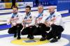 Canada&rsquo;s Matt Dunstone, Colton Lott, E.J. Harnden and Ryan Harnden celebrate winning silver at the curling world championships, Saturday. (AP Photo/Tyler Tate)