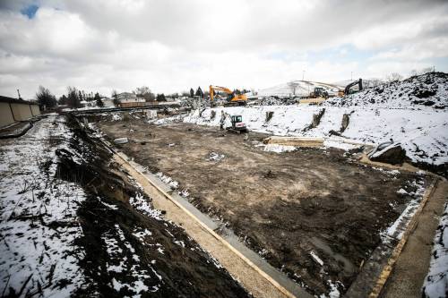 MIKAELA MACKENZIE / FREE PRESS
                                The site of a new 96-unit apartment complex being constructed on the Kimberly Avenue lot where an unfinished condo complex project burned in 2022.