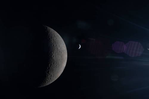 NASA
                                The Moon and Earth align in the same frame, each partially illuminated by the Sun.