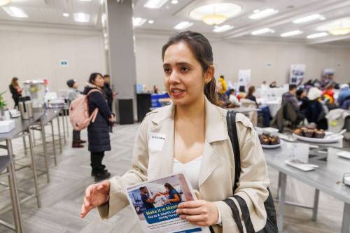 MIKE DEAL / FREE PRESS Srishty Sharma moved to Winnipeg from India in 2024 and was able to get her credentials up-to-date in 2025. Srishty started applying for jobs in January and is hoping some of the interviews she has set up during the forum work out. The Make it in Manitoba Nurse and Health Care Aide hiring forum hosted by the Health Care Retention and Recruitment Office (HCRRO) at the RBC Convention Centre Wednesday. The one-day hiring forum is designed to support Registered Nurses and certified HCAs helping them launch or advance their careers within Manitoba’s health system. Reporter: Gabrielle Piche 260408 - Wednesday, April 08, 2026.