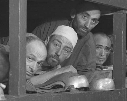 Pvt. H. Miller photo / U.S. National Archives
                                Slave laborers in the Buchenwald concentration camp near Jena; many had died from malnutrition when U. S. troops of the 80th Division entered the camp.