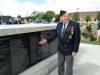 Supplied
                                At the Wall of Remembrance in Brandon, where his name is among those of local military veterans.