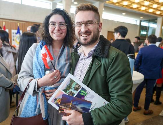 Nick Kuznetsov celebrates becoming a Canadian citizen with his partner Val Shevchenko at city hall Thursday. The couple, both from Moscow, met in Canada. (Ruth Bonneville / Free Press)