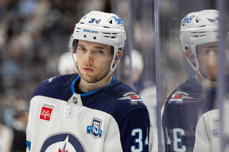 Melissa Majchrzak / THE ASSOCIATED PRESS
                                Winnipeg Jets defenceman Ville Heinola has been a perpetual healthy scratch with the club.