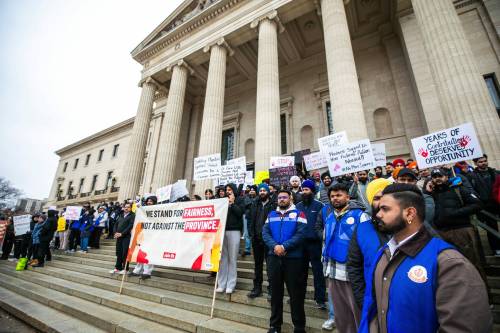 MIKAELA MACKENZIE / FREE PRESS
                                International students rally outside of the Manitoba Legislative Building earlier this week over expiring federal work permits.