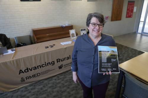 Connor McDowell / Brandon Sun
                                Margot Cathcart with a copy of the Pulse of Manitoba: 2026 report, commissioned by Rural Manitoba Economic Development.