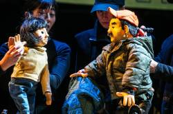 MIKAELA MACKENZIE / FREE PRESS
                                Daughter and father communicate without words in Otosan.