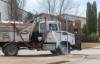 MIKE DEAL / FREE PRESS
                                A water truck and a sidewalk cleaner work their way through the Point Road neighbourhood Thursday afternoon.