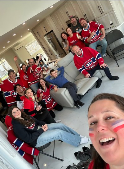 Melissa Parise and members of her family, wearing Montreal Canadiens jerseys, prepare to watch game 7 of the playoff series at the Bell Centre in downtown Montreal as the Canadiens take on the Tampa Bay Lightning in Tampa. THE CANADIAN PRESS/Handout-Melissa Parise (Mandatory credit)