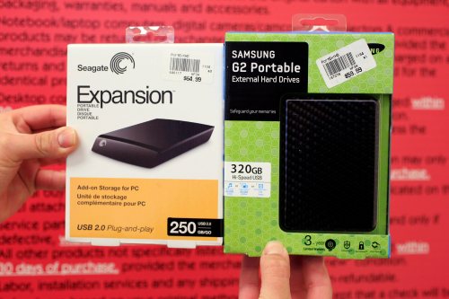 A Seagate hard drive, left, is shown next to a Samsung hard drive, right, at Micro Center in Santa Clara, Calif., Tuesday, April 19, 2011. (AP Photo/Paul Sakuma)