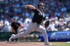 New York Yankees starting pitcher Gerrit Cole throws against the Chicago Cubs during the first inning of a spring training baseball game, Tuesday, March 24, 2026, in Mesa, Ariz. (AP Photo/Ross D. Franklin)