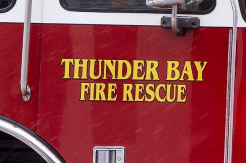 Officials say one person is dead and two people were sent to hospital after a tent caught fire at a Thunder Bay homeless encampment. Thunder Bay Fire Rescue logo is shown in Thunder Bay, Ont. on Thursday December 23, 2021.  THE CANADIAN PRESS/David Jackson