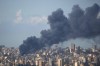 Smoke rises following an Israeli airstrike on a building in Beirut, Lebanon, Wednesday, April 8, 2026. (AP Photo/Hassan Ammar)