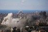 Smoke rises following several Israeli airstrikes in Beirut, Lebanon, Wednesday, April 8, 2026. (AP Photo/Hassan Ammar)