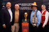 CONCACAF President, Victor Montagliani, Mudqueam Nation Chief Wayne Sparrow, Squamish Nation General Councillor Wilson Williams and Tsleil-Waututh Nation Councillor Curtis Thomas pose with the FIFA World Cup Winners Trophy in Vancouver, B.C., on Saturday, August 23, 2025. THE CANADIAN PRESS/Ethan Cairns