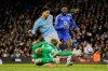 FILE - Leicester's goalkeeper Mads Hermansen, foreground, fails to save the goal scored by Manchester City's Omar Marmoush, center, during the English Premier League soccer match at the Etihad stadium in Manchester, England, April 2, 2025. (AP Photo/Dave Thompson, File)