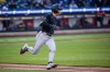 Arizona Diamondbacks' Corbin Carroll (7) triples during the seventh inning of a baseball game against the New York Mets, Wednesday, April 8, 2026, in New York. (AP Photo/Angelina Katsanis)