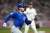 Chicago Cubs' Nico Hoerner runs the bases after his RBI double off Tampa Bay Rays pitcher Joe Boyle during the fifth inning of a baseball game Wednesday, April 8, 2026, in St. Petersburg, Fla. (AP Photo/Chris O'Meara)