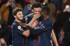 PSG players celebaret after a goal during a League One soccer match between Paris Saint-Germain and Toulouse in Paris, France, Friday, April 3, 2026. (AP Photo/Emma Da Silva)