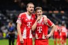 Bayern's Harry Kane, left, and teammate Joshua Kimmich look at the fans after the Champions League quarterfinal first leg soccer match between Real Madrid and Bayern Munich in Madrid, Spain, Tuesday, April 7, 2026. (AP Photo/Jose Breton)